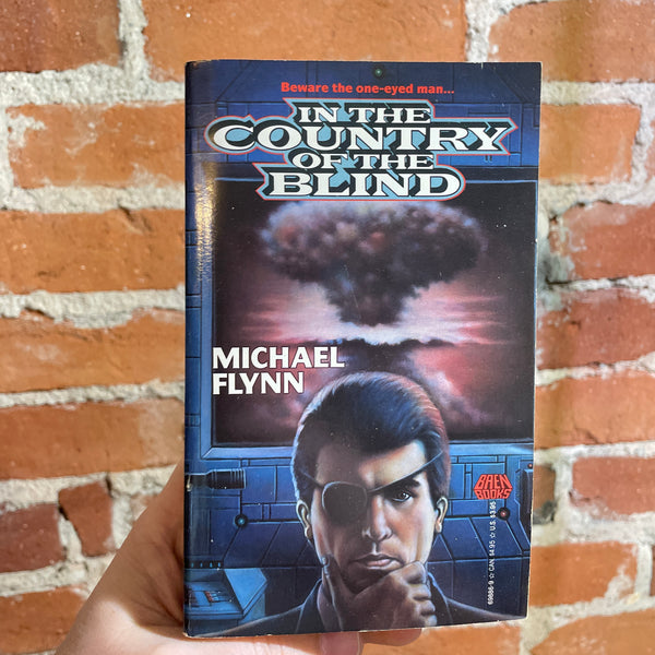 In the Country of the Blind - Michael Flynn - 1990 Baen Books Paperback - John Rheaume Cover