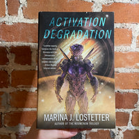 Activation Degradation - Marina J. Lostetter - 2021 1st Harper Paperback - Adam M. Milicevie Cover