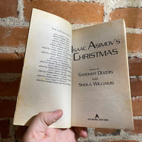 Isaac Asimov’s Christmas - Edited by Gardner Dozois and Sheila Williams - 1997 Ace Books Paperback - Les Edwards Cover