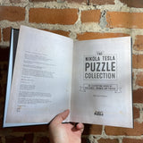 The Nikola Tesla Puzzle Collection: An Electrifying Series of Challenges, Enigmas, and Puzzles - Richard Galland - 2015 Hardback