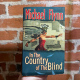 In the Country of the Blind - Michael Flynn - 2003 Tor Books Paperback - Allan Pollack Cover