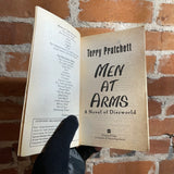 Men At Arms - Terry Pratchett - 1997 Harper Collins Discword Paperback - Michael Sabanosh Cover