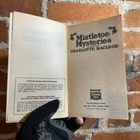 Mistletoe Mysteries: Tales of Yuletide Murder - Collected by Charlotte Macleod - 1989 Mysterious Press Paperback - Mark Hess Cover