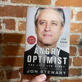 Angry Optimist: The Life and Times of Jon Stewart - Lisa Rogak - 2015 Paperback