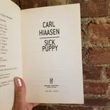 Sick Puppy - Carl Hiaasen 1999 Grand Central Publishing PB