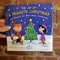 The Joy of a Peanuts Christmas: 50 Years of Holiday Comics! - Charles M. Schulz 2000 Hallmark Books HBDJ