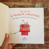 The Joy of a Peanuts Christmas: 50 Years of Holiday Comics! - Charles M. Schulz 2000 Hallmark Books HBDJ