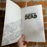 The Walking Dead Vol. 1: Days Gone Bye & Vol. 02: Miles Behind Us- Robert Kirkman, Tony Moore, Charlie Adlard, & Cliff Rathburn